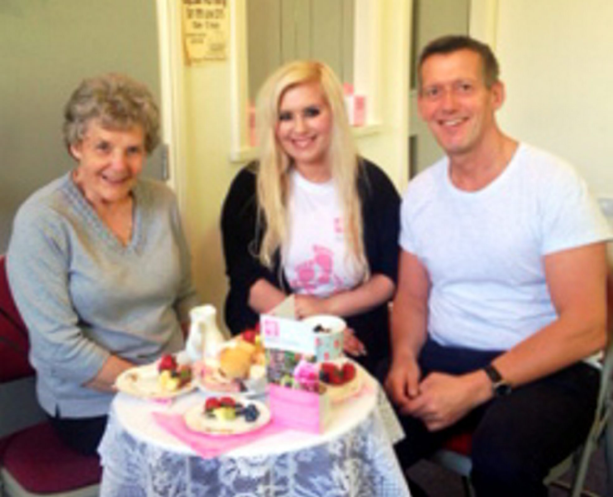 Newly-qualified solicitor celebrates success with charity afternoon tea for Bolton Hospice