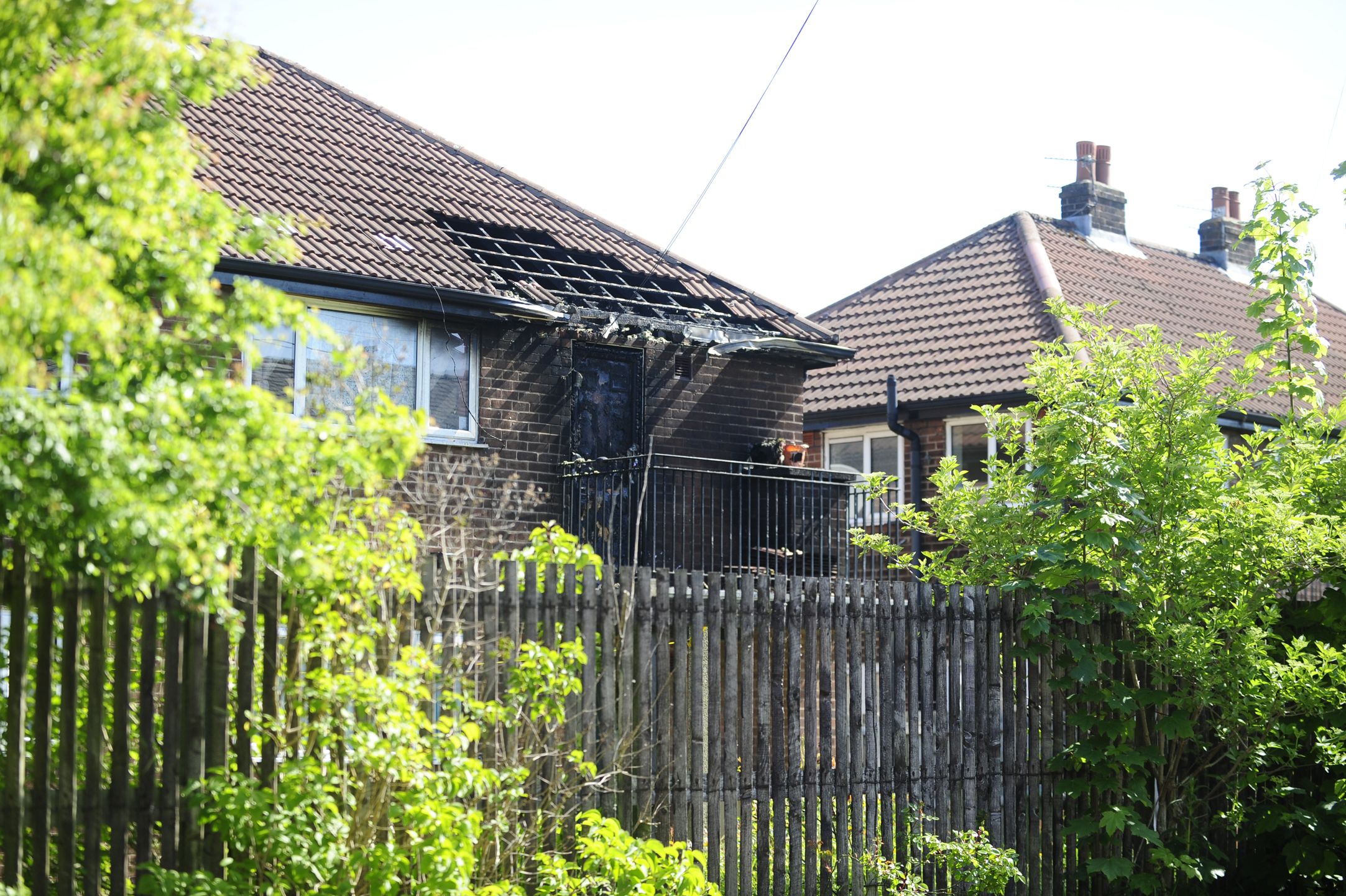 UPDATED: Woman taken to hospital with burns after pouring petrol onto log burner on balcony