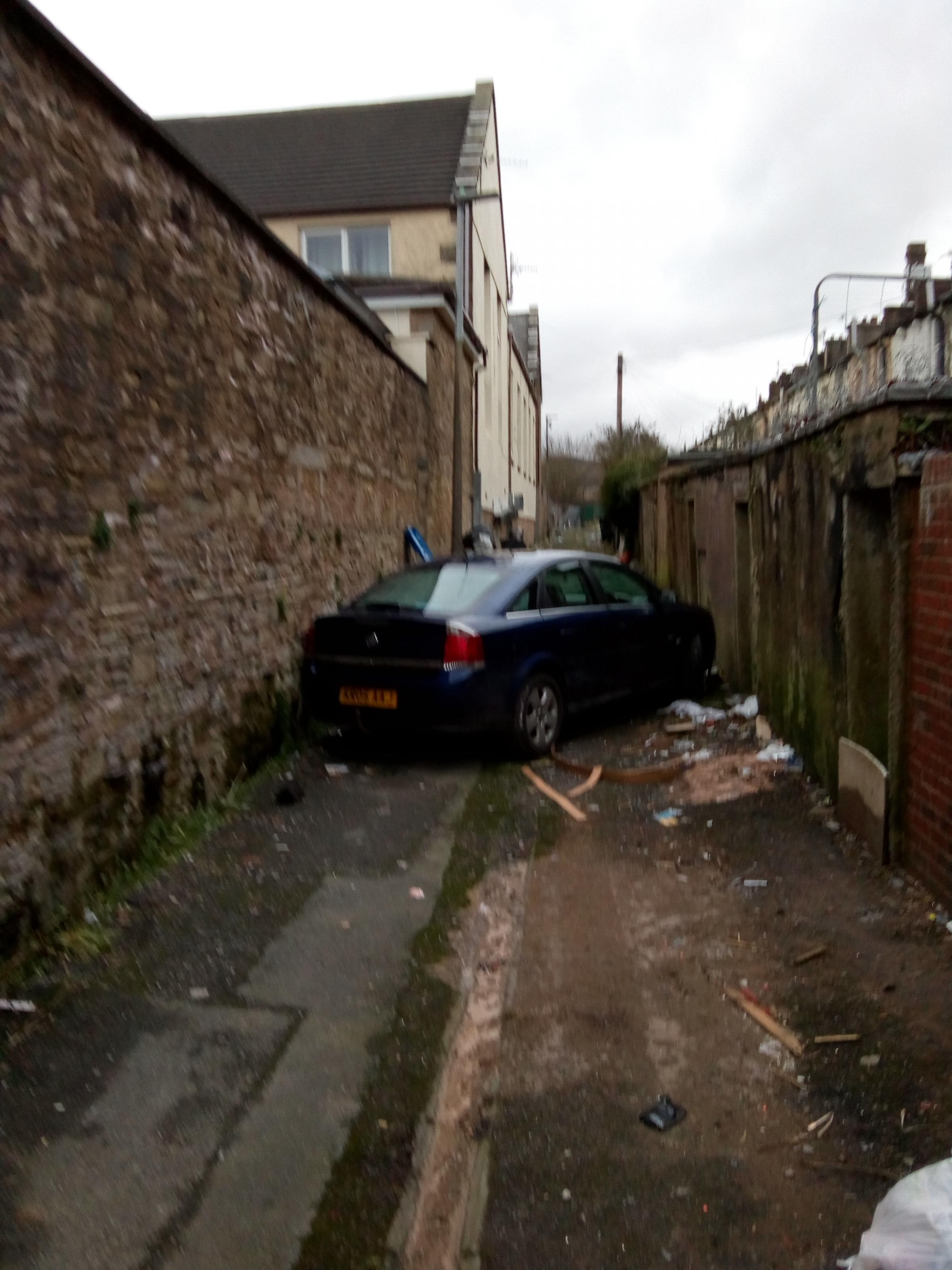 The car abandoned at the rear of Olive Lane in Darwen