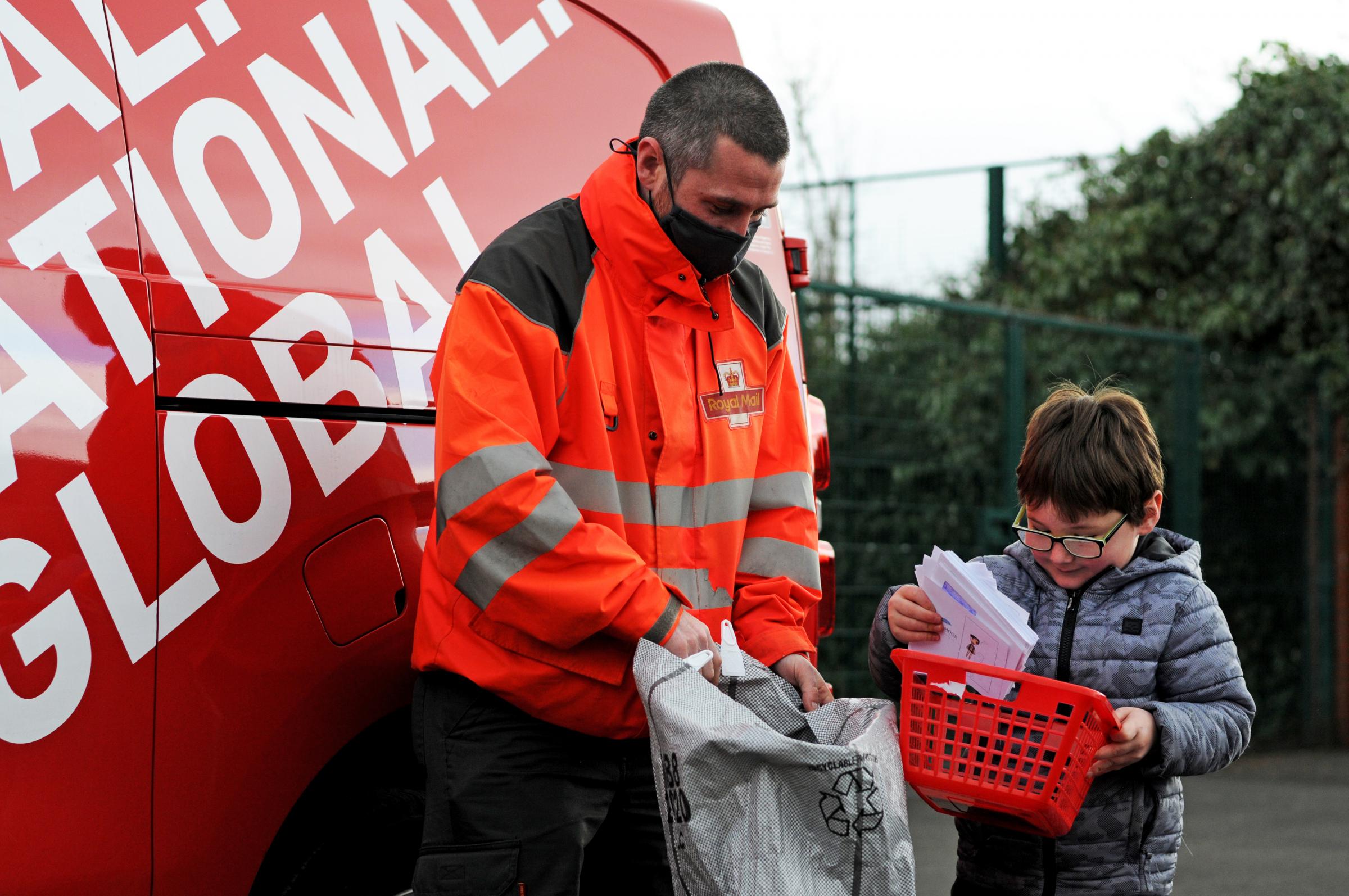 Tonge Moor Primary Schools visit by postman Gareth Nicholls. Picture by George Haslam