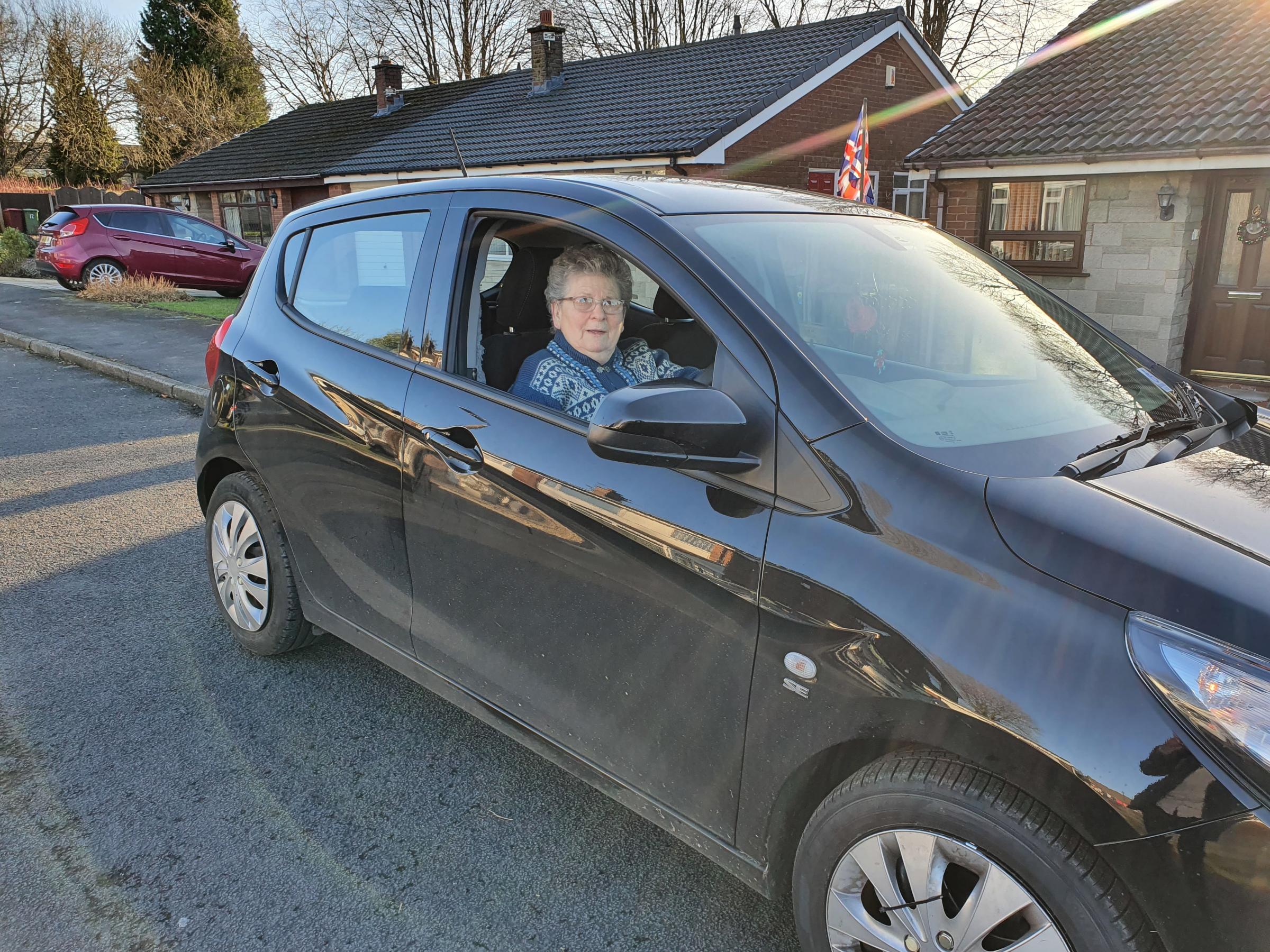 Theresa Scott and the car she broke down in