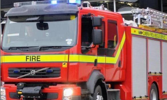 Firefighters break down door to fight kitchen fire in Farnworth