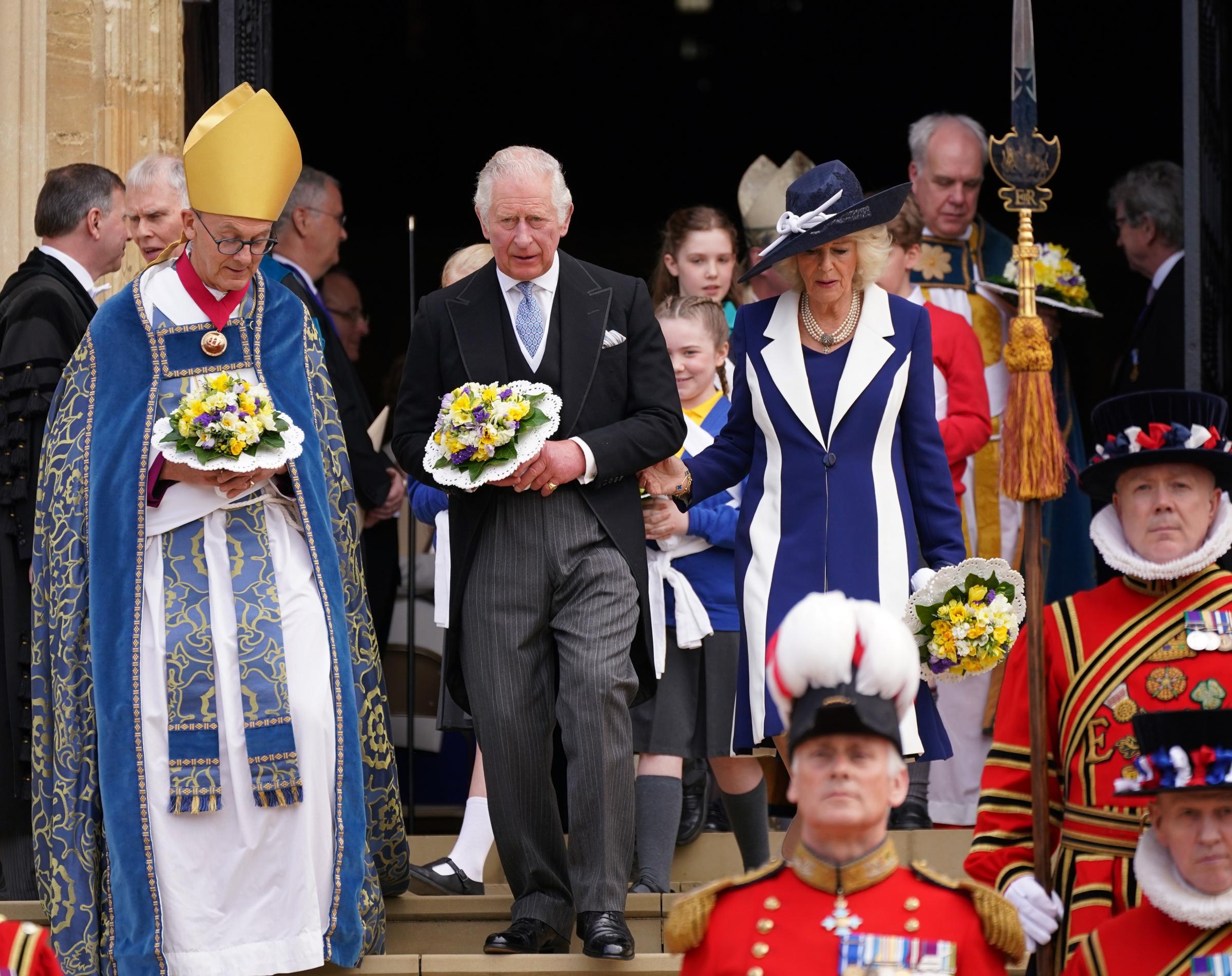 The Prince of Wales, representing the Queen and the Duchess of Cornwall, leave St Georges Chapel, Windsor, following the Royal Maundy Service. Picture date: Thursday April 14, 2022.